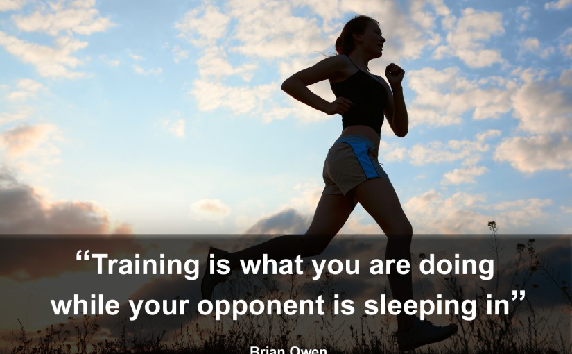 picture of a runners with a quote that says "Training is what you are doing while your opponent is sleeping in"